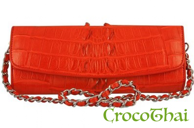Купить сумка-клатч оранжевая из кожи крокодила